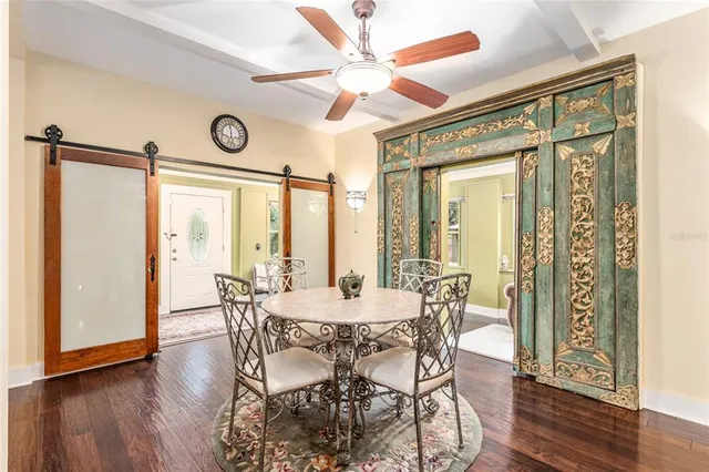 a large kitchen with stainless steel appliances granite countertop a stove and a sink