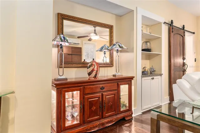 a kitchen with stainless steel appliances granite countertop a sink and cabinets