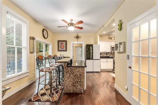 a view of a living room with a large window