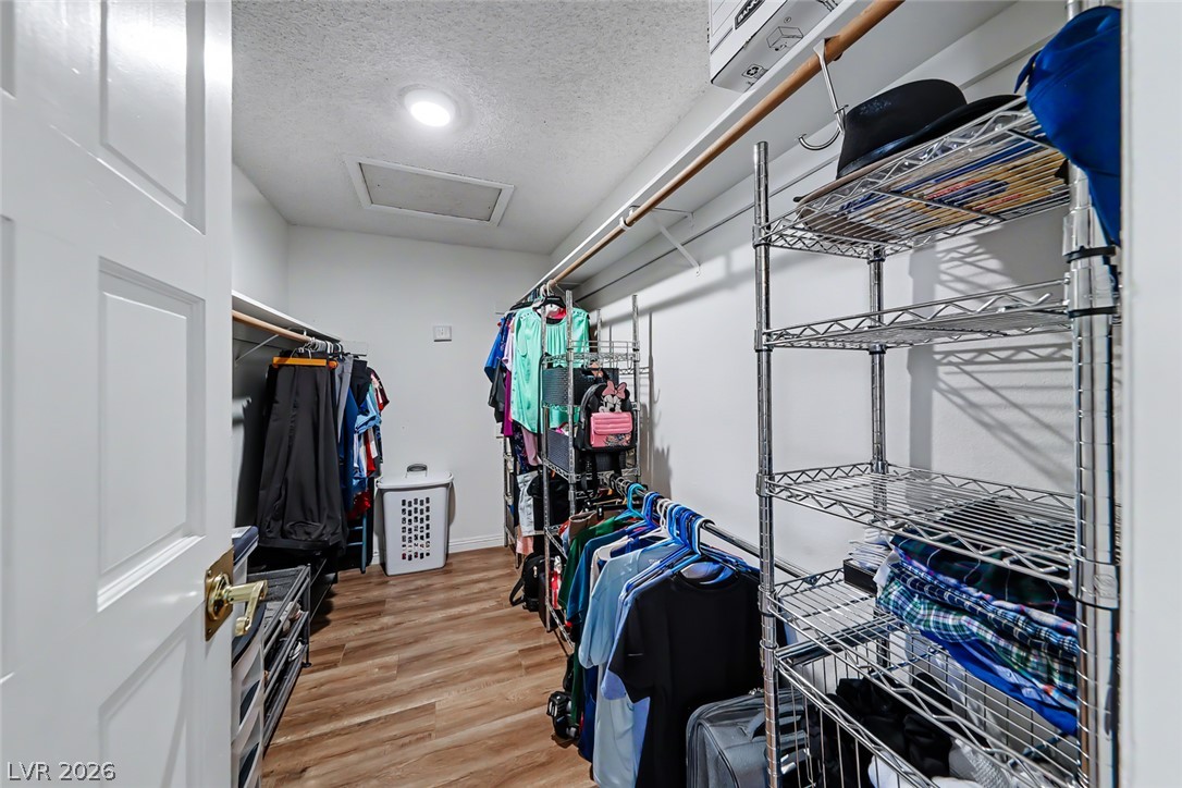 3107 Trueno Road Henderson, NV 89014 - Photo 25 of 37 Functional closet with ample storage solutions, perfect for organizing your wardrobe.