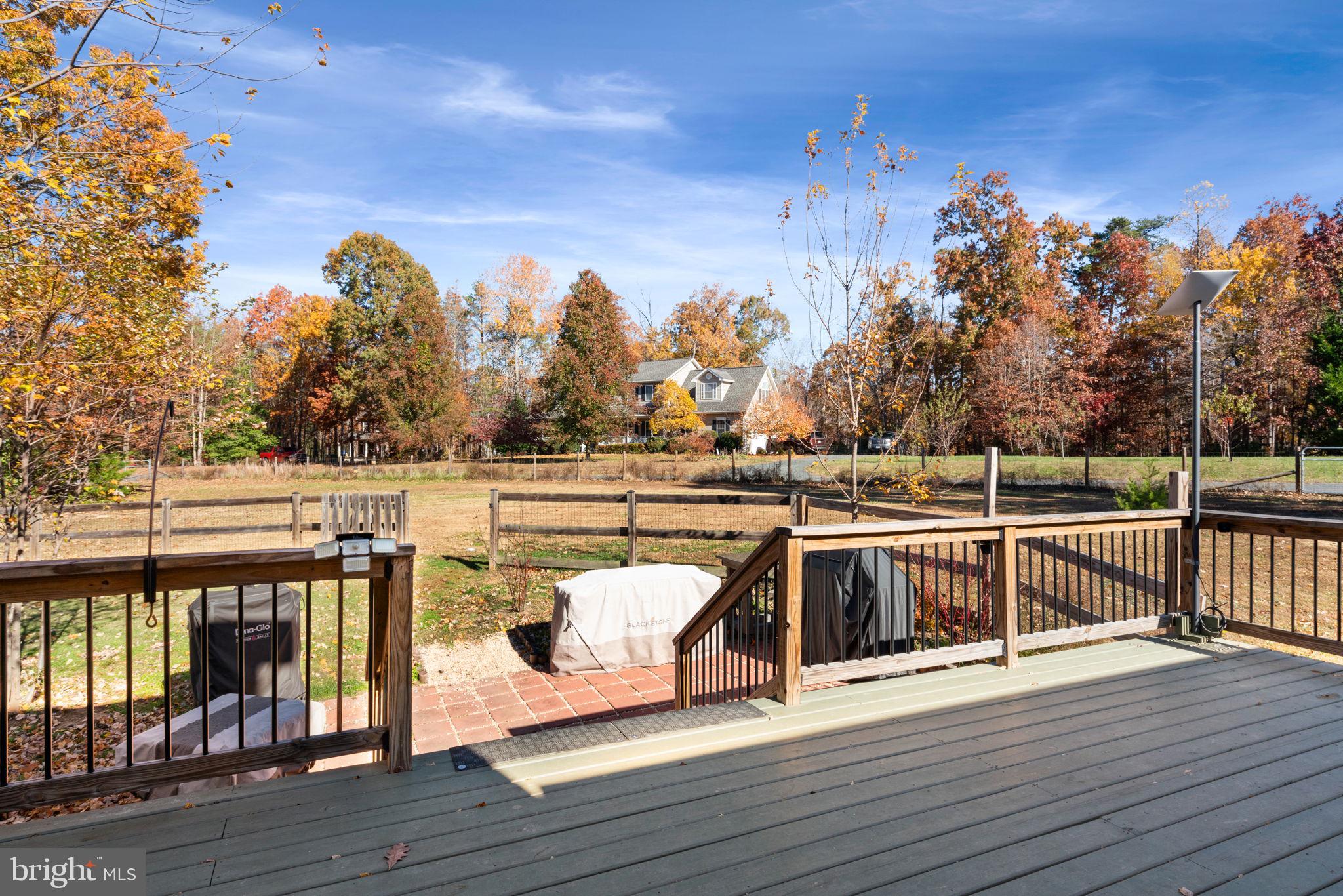 2182 Towles Road Midland, VA 22728 - Photo 48 of 50 a view of a balcony with wooden floor and fence