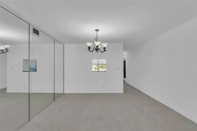 a view of an empty room with window