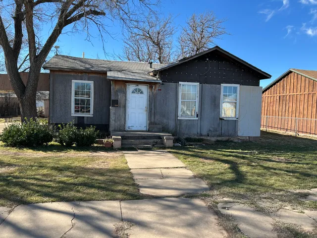 a view of a house with a swimming pool