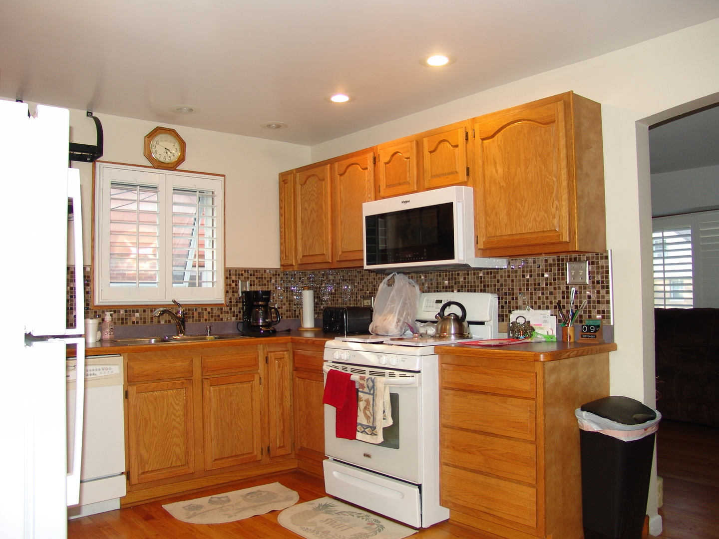 2121 Downey Road Homewood, IL 60430 - Photo 8 of 35 a kitchen with a sink appliances and cabinets