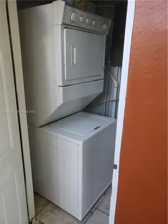 a utility room with a washer and dryer