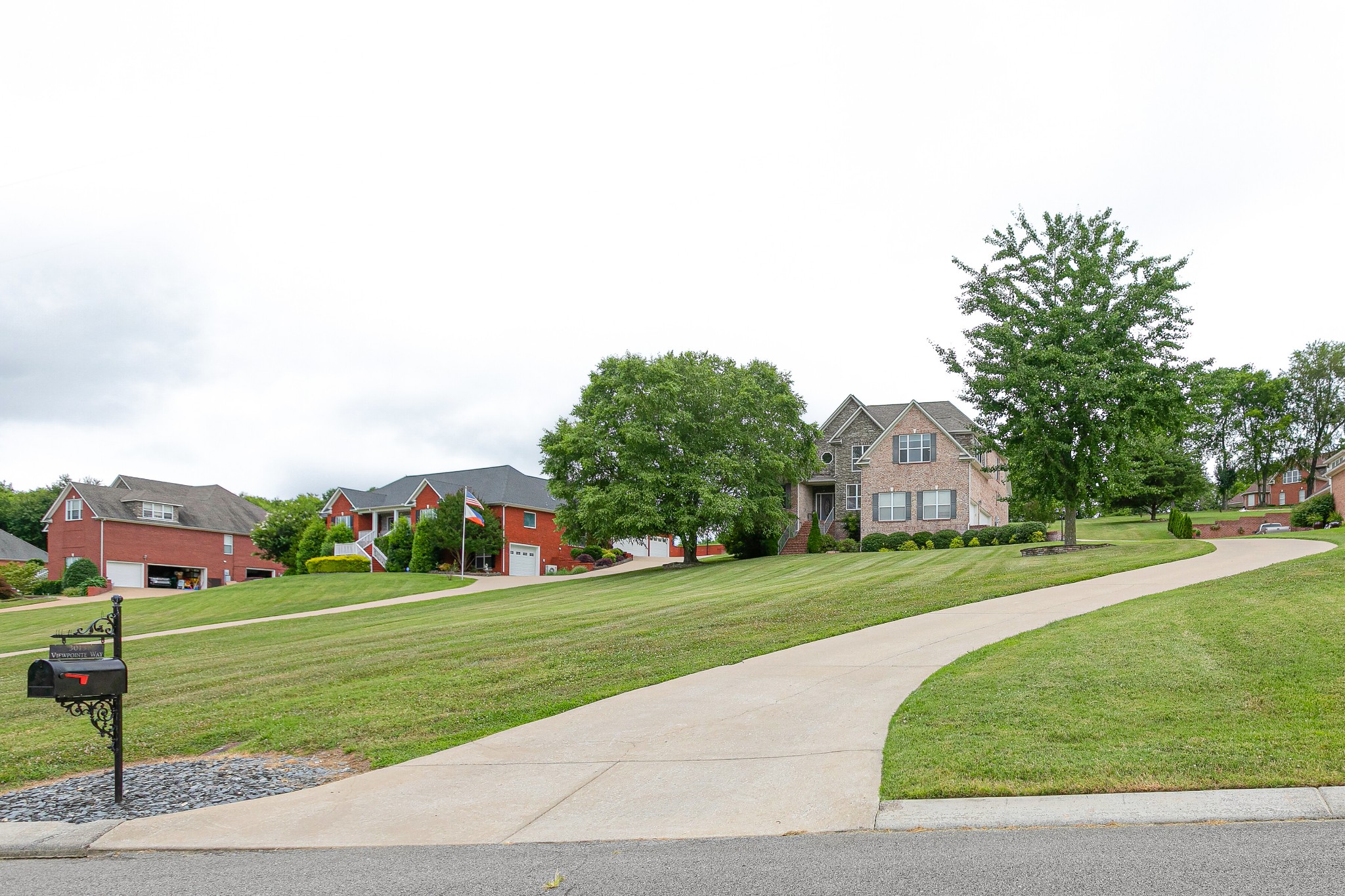 3013 Viewpointe Way Columbia, TN 38401 - Photo 2 of 39 a view of a grassy field with trees