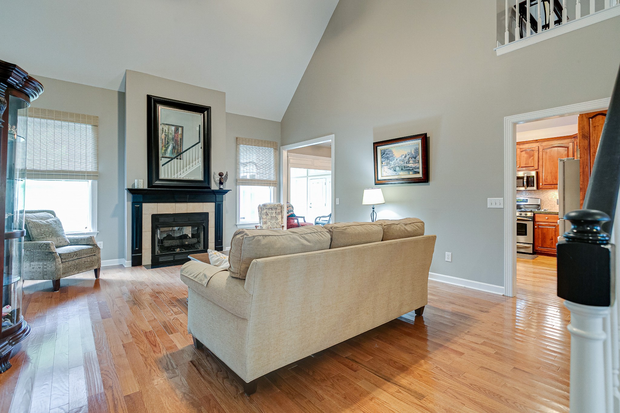 3013 Viewpointe Way Columbia, TN 38401 - Photo 12 of 39 a living room with furniture a fireplace and a flat screen tv