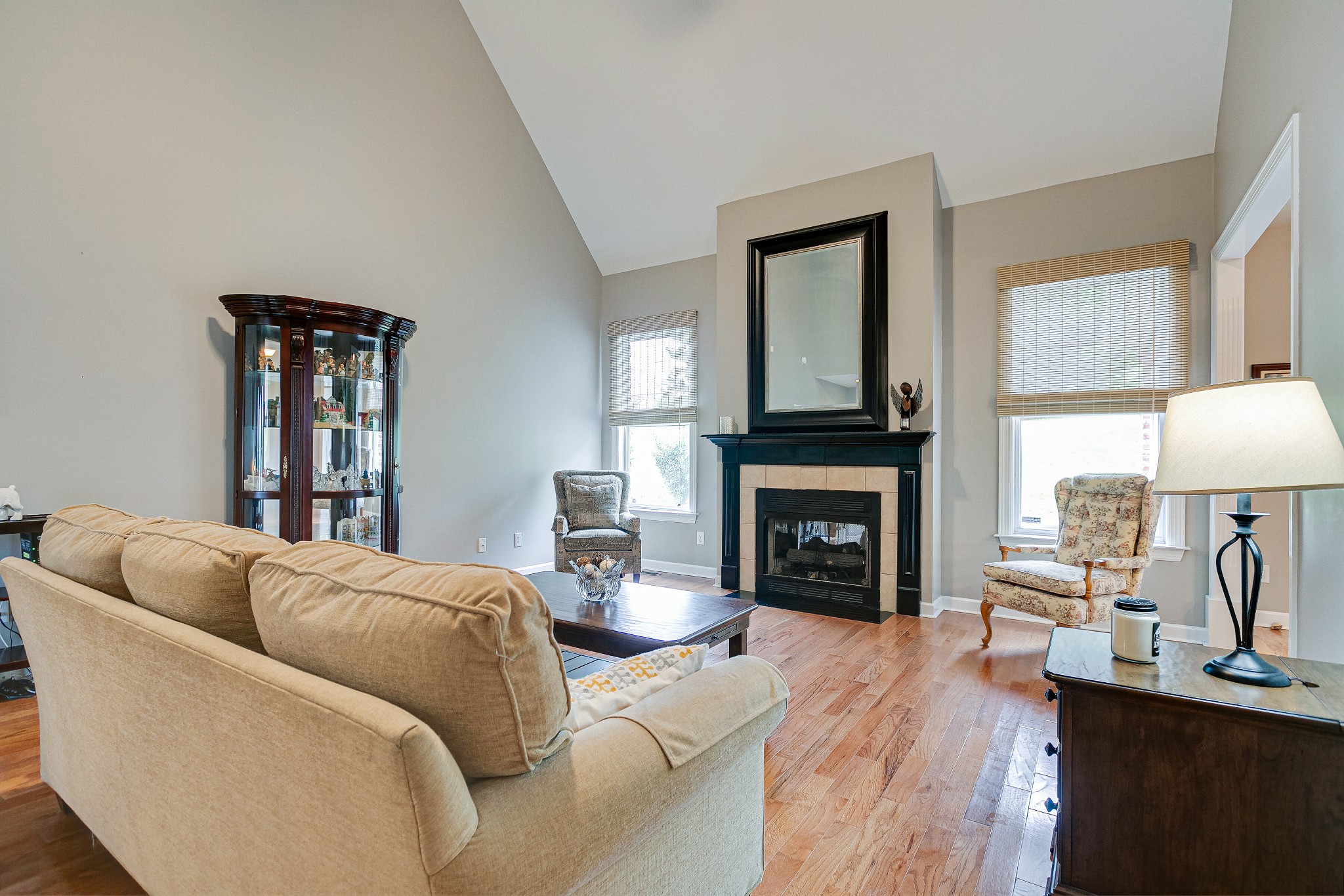 3013 Viewpointe Way Columbia, TN 38401 - Photo 13 of 39 a living room with furniture a fireplace and a large window