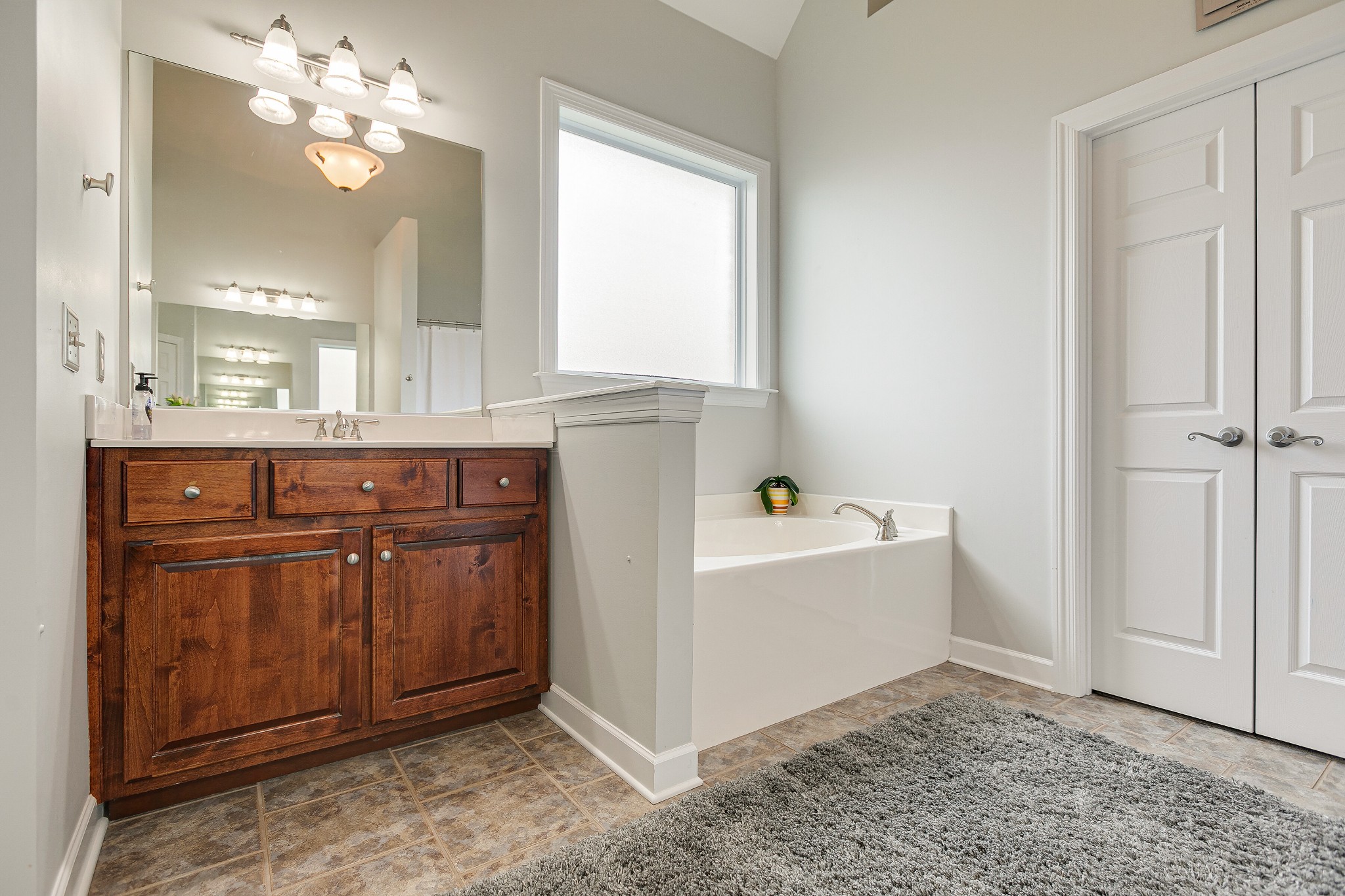 3013 Viewpointe Way Columbia, TN 38401 - Photo 23 of 39 a bathroom with a sink and a mirror