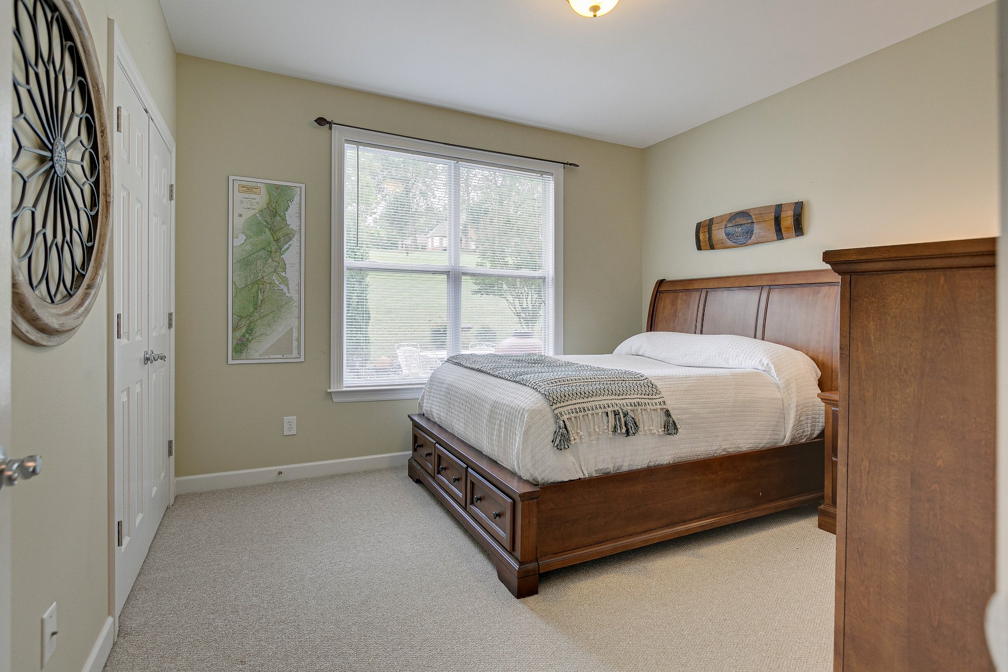3013 Viewpointe Way Columbia, TN 38401 - Photo 24 of 39 a bed sitting in a bedroom next to a window