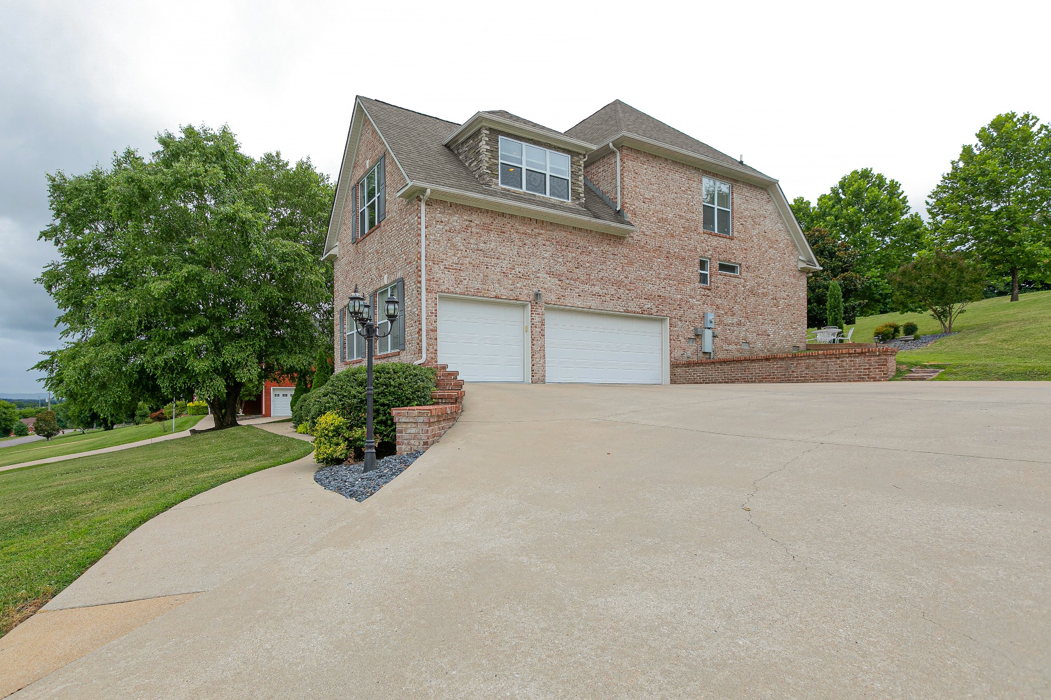 3013 Viewpointe Way Columbia, TN 38401 - Photo 5 of 39 a front view of a house with a yard and garage