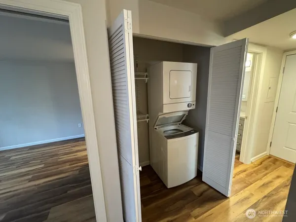 a view of a storage & utility room with a sink