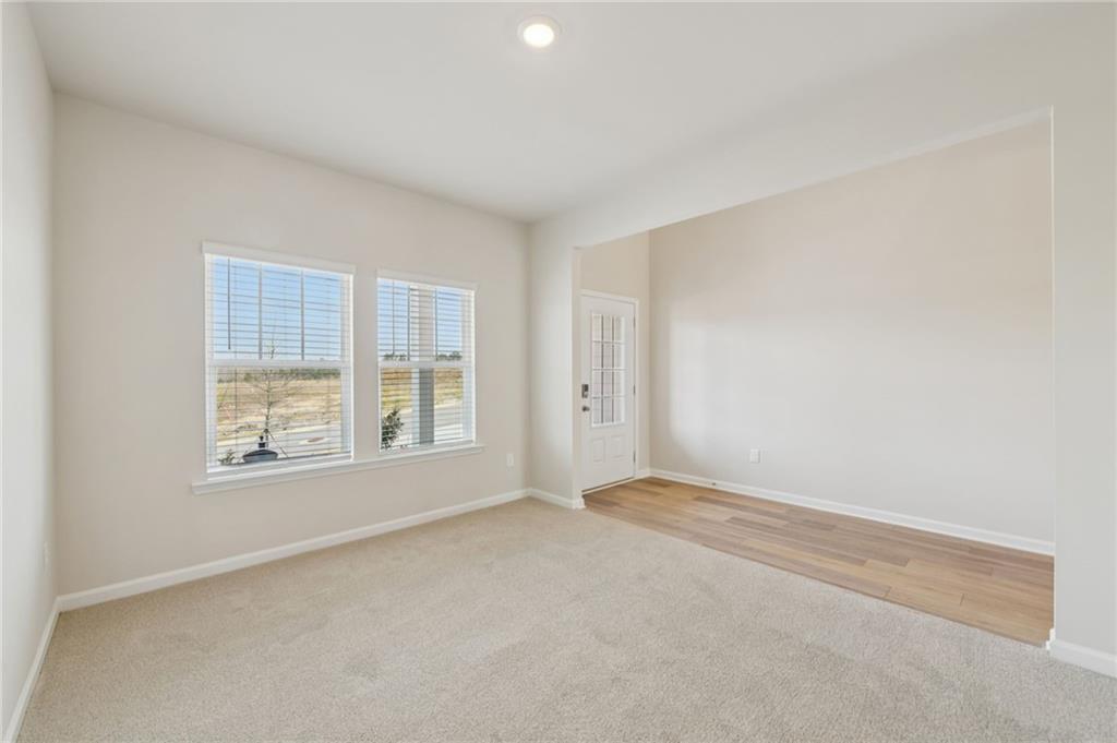 405 Morgan Crk Road Pendergrass, GA 30567 - Photo 21 of 48 an empty room with windows