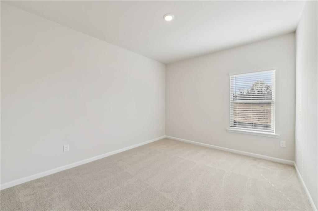 405 Morgan Crk Road Pendergrass, GA 30567 - Photo 24 of 48 an empty room with a window