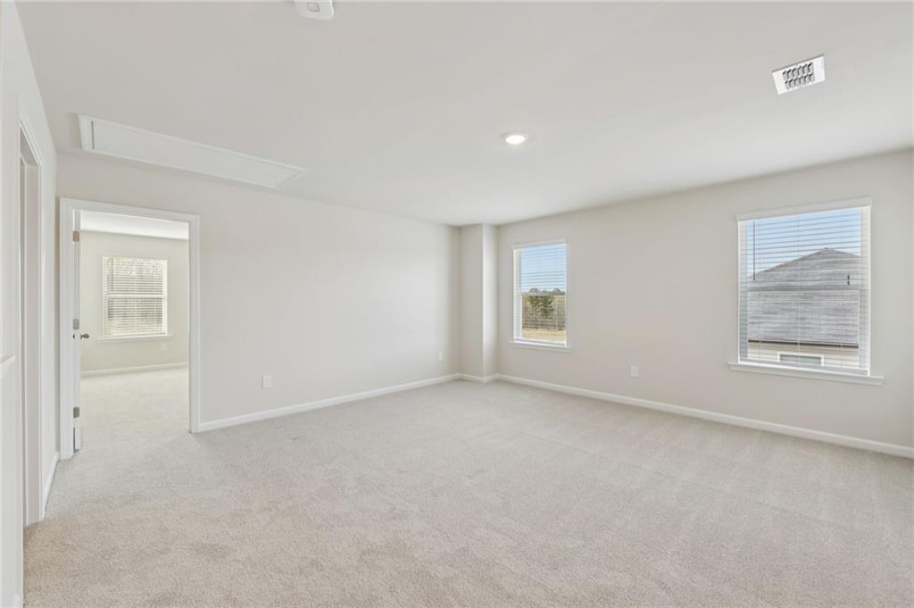 405 Morgan Crk Road Pendergrass, GA 30567 - Photo 26 of 48 an empty room with windows