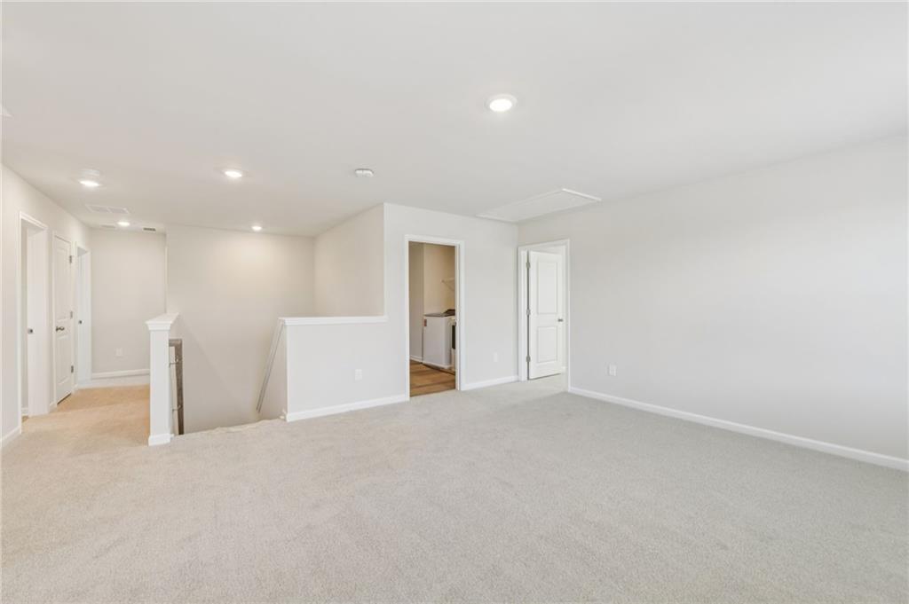 405 Morgan Crk Road Pendergrass, GA 30567 - Photo 27 of 48 a view of an empty room with a kitchen