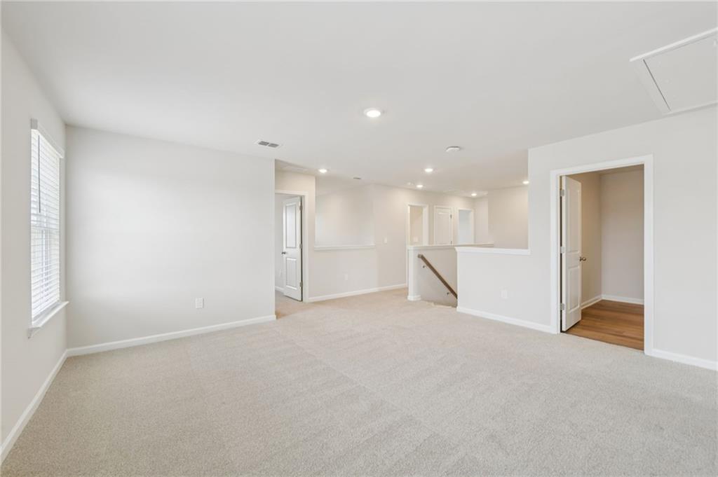 405 Morgan Crk Road Pendergrass, GA 30567 - Photo 28 of 48 a view of an empty room with a kitchen