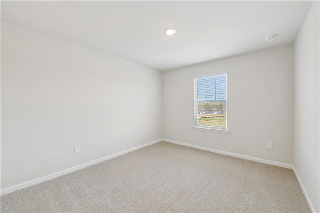 405 Morgan Crk Road Pendergrass, GA 30567 - Photo 37 of 48 an empty room with a window