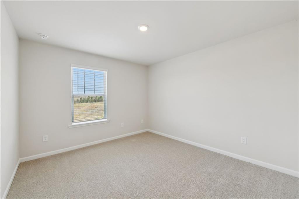 405 Morgan Crk Road Pendergrass, GA 30567 - Photo 39 of 48 an empty room with a window