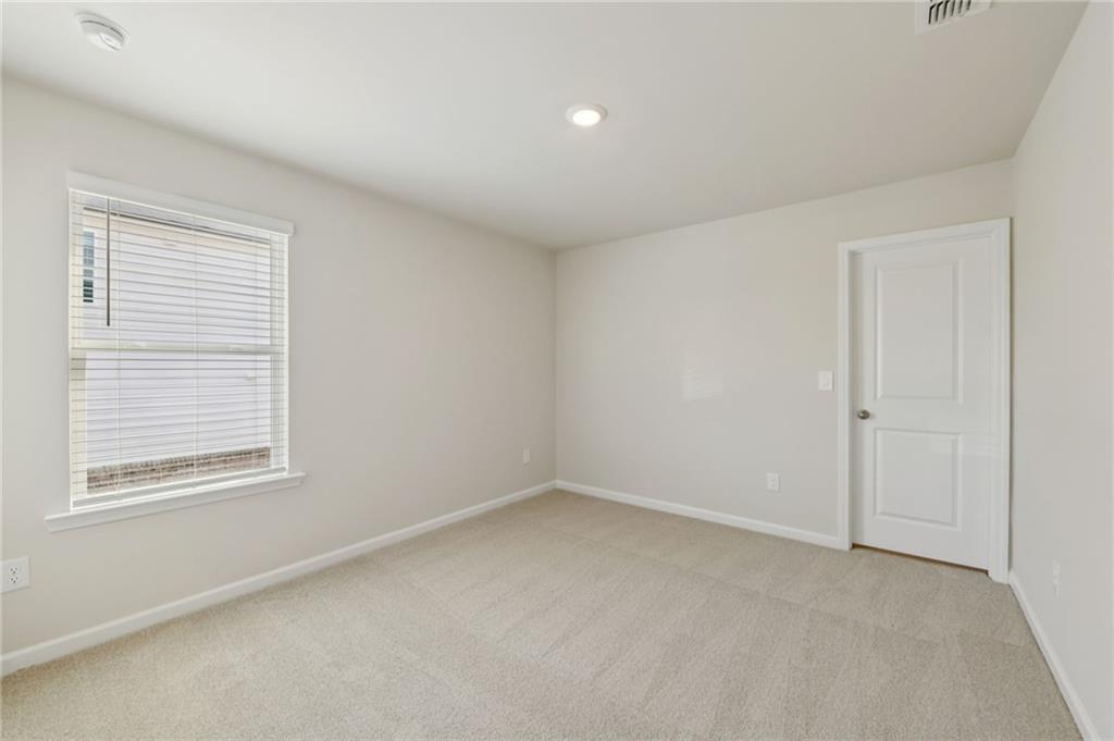 405 Morgan Crk Road Pendergrass, GA 30567 - Photo 41 of 48 an empty room with a window
