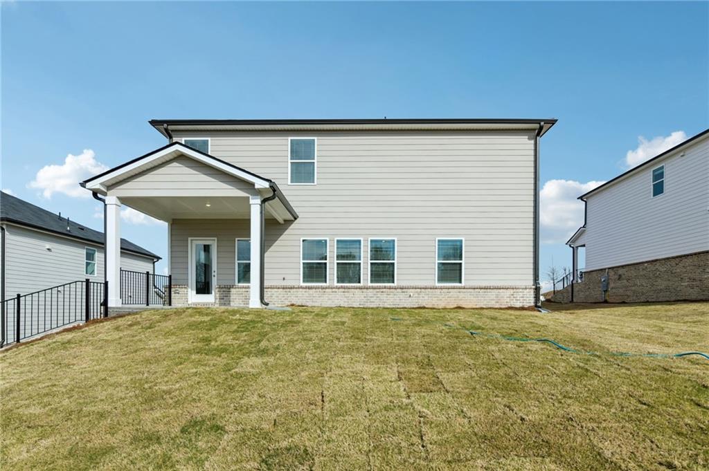 405 Morgan Crk Road Pendergrass, GA 30567 - Photo 45 of 48 a front view of a house with a yard