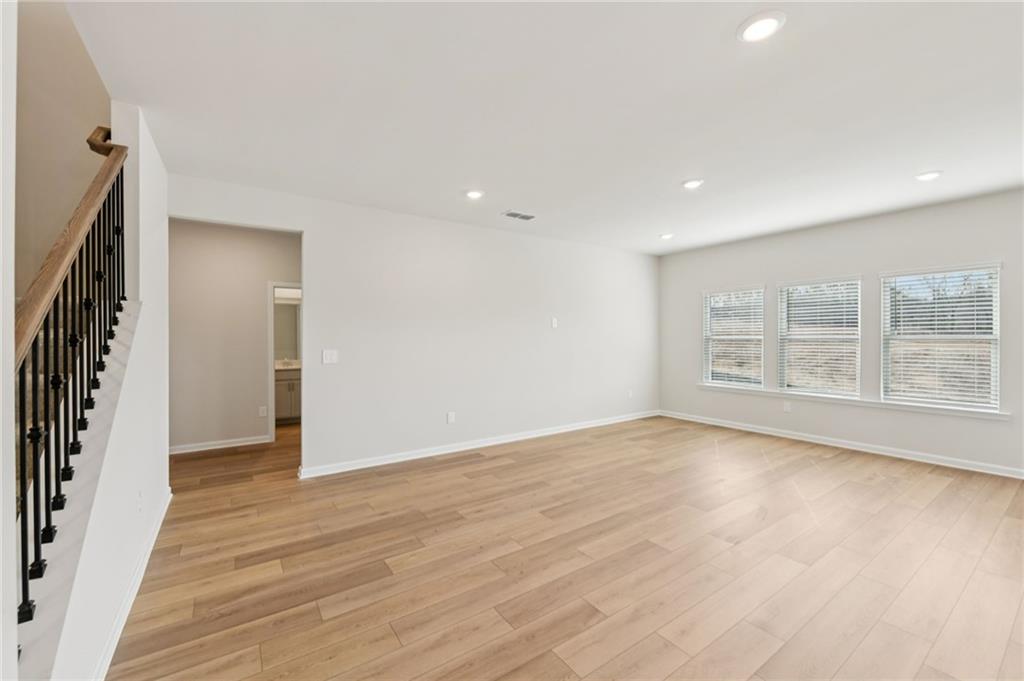 405 Morgan Crk Road Pendergrass, GA 30567 - Photo 7 of 48 wooden floor in an empty room with a window