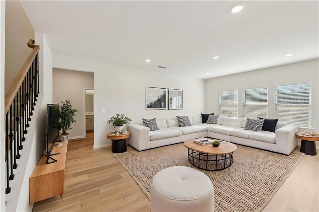 405 Morgan Crk Road Pendergrass, GA 30567 - Photo 8 of 48 a living room with furniture and a large window