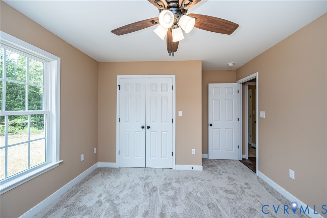 1900 Moody Fox Lane Carson, VA 23830 - Photo 21 of 38 a view of an empty room with a window