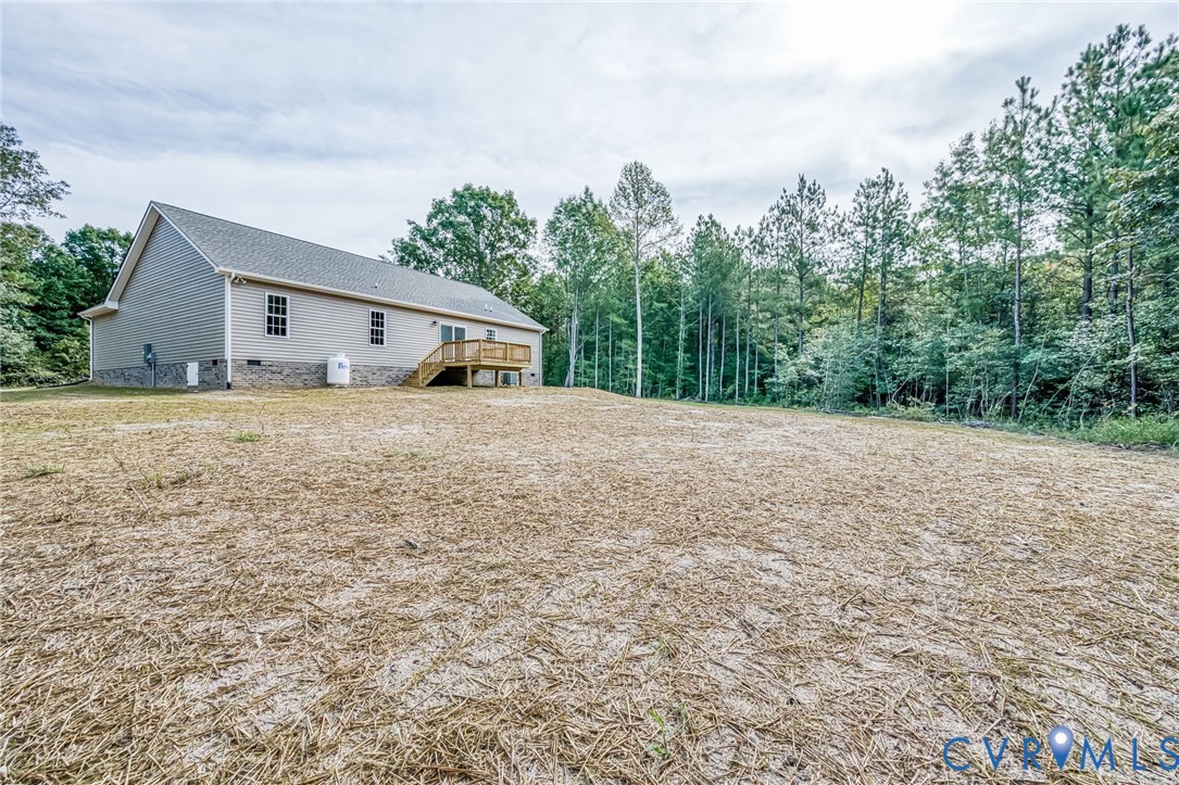 1900 Moody Fox Lane Carson, VA 23830 - Photo 28 of 38 a big house with a big yard and large trees