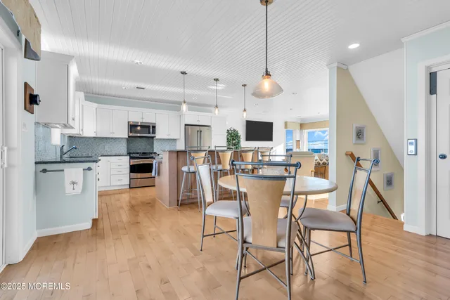 a kitchen with stainless steel appliances granite countertop a sink and a granite counter tops