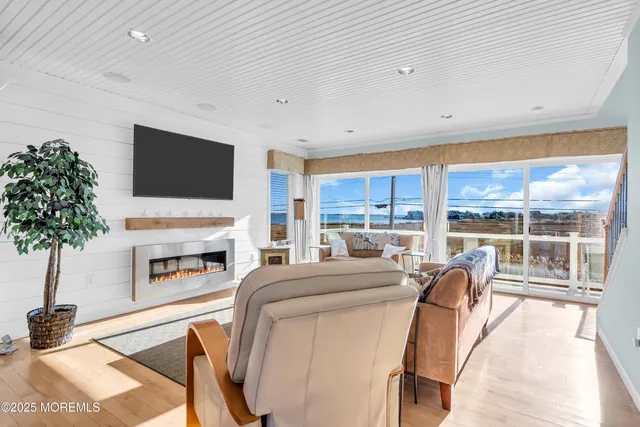 a bedroom with a large bed and a couch