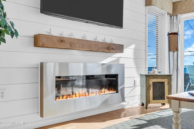a bathroom with a glass shower door