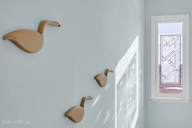 a view of a city from a chairs and table in the patio
