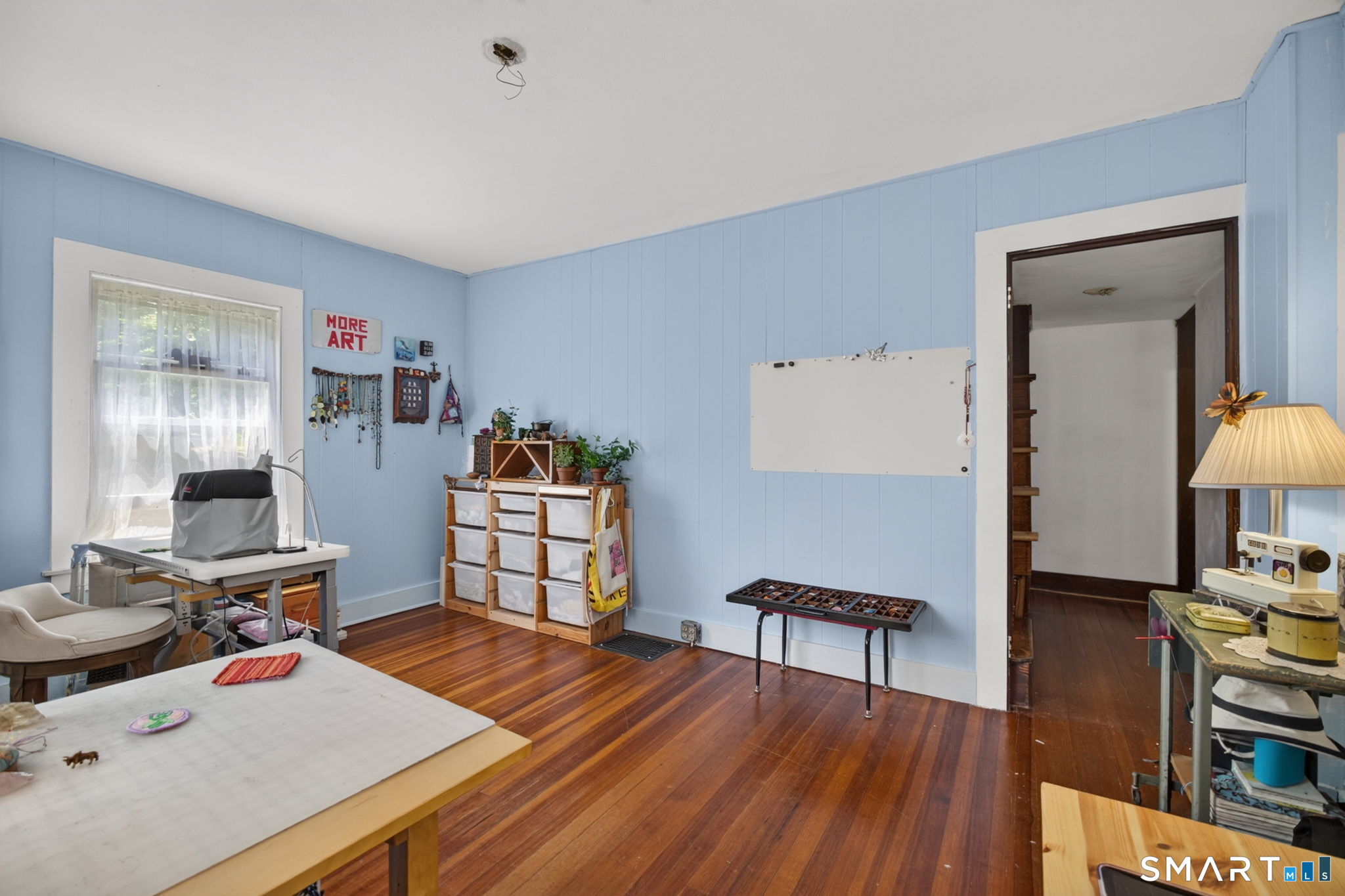 79 River Street Deep River, CT 06417 - Photo 22 of 40 a workspace with furniture and wooden floor