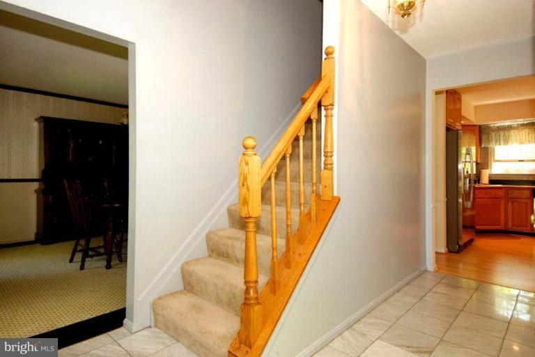 1907 Ridgewood Road Hanover, MD 21076 - Photo 12 of 30 a view of a hallway with furniture and entryway