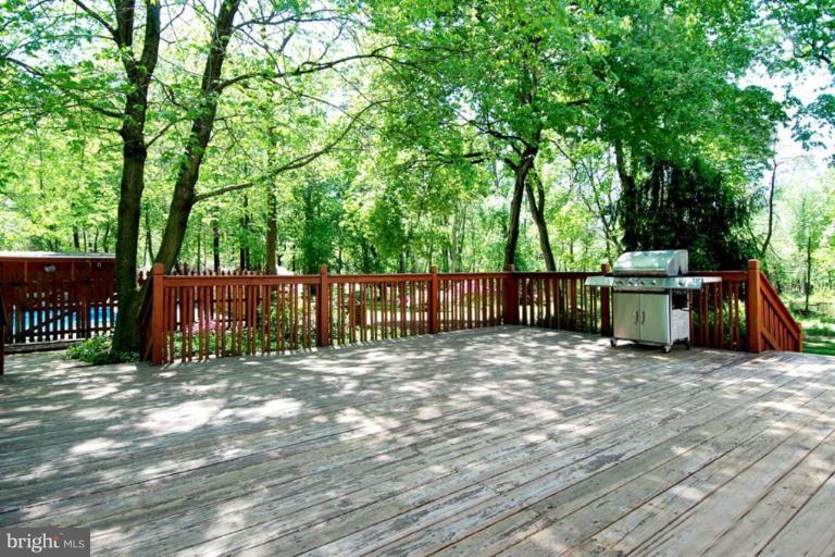 1907 Ridgewood Road Hanover, MD 21076 - Photo 13 of 30 a view of a wooden fence and trees