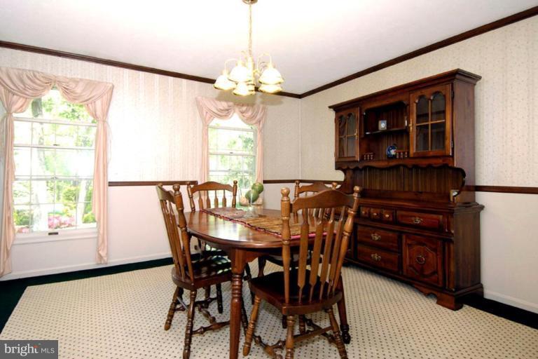 1907 Ridgewood Road Hanover, MD 21076 - Photo 14 of 30 a view of a dining room with furniture window and outside view