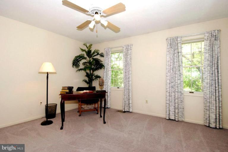 1907 Ridgewood Road Hanover, MD 21076 - Photo 20 of 30 a view of a workspace with furniture and a window