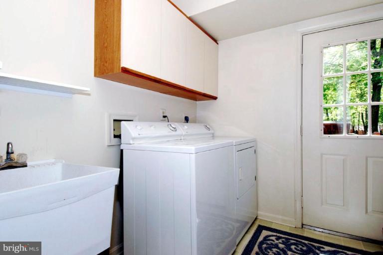 1907 Ridgewood Road Hanover, MD 21076 - Photo 22 of 30 a utility room with dryer and washer