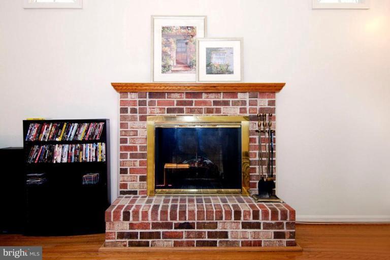 1907 Ridgewood Road Hanover, MD 21076 - Photo 26 of 30 a living room with furniture and a fireplace