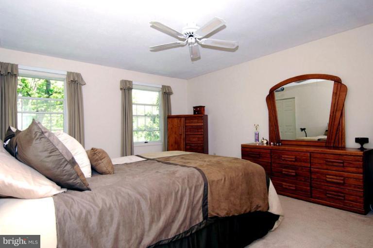 1907 Ridgewood Road Hanover, MD 21076 - Photo 28 of 30 a bedroom with a bed and window