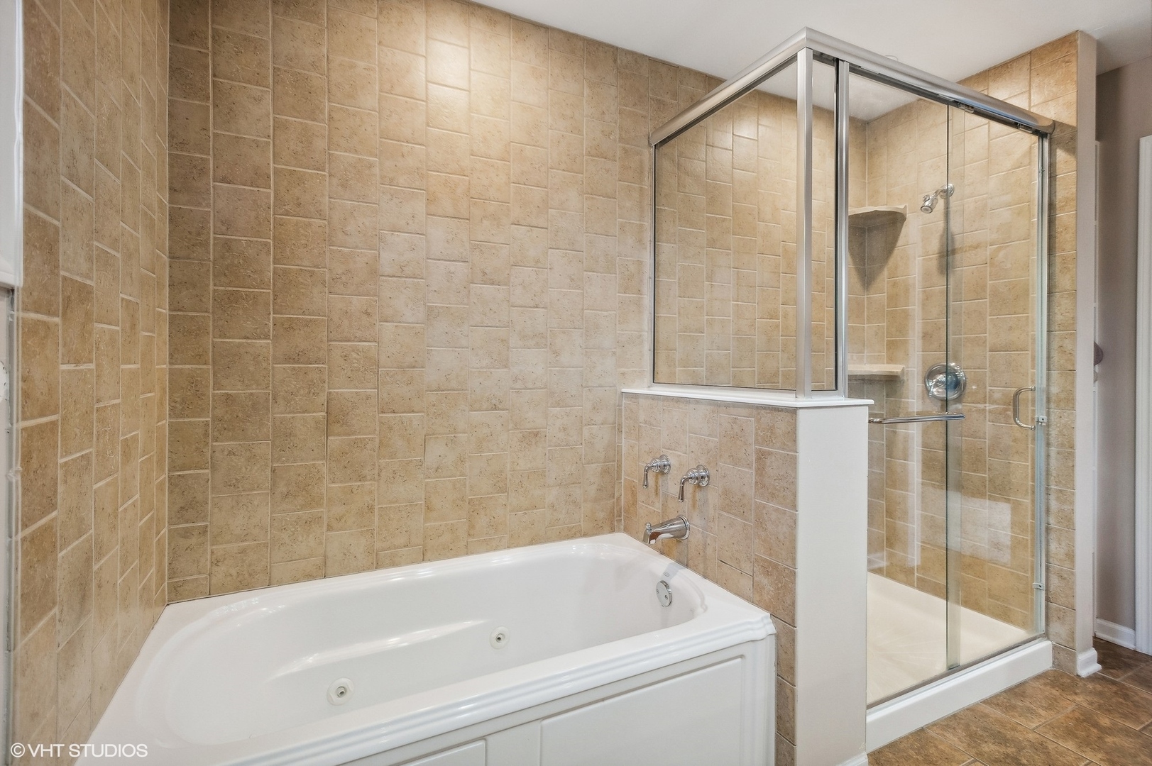 3951 Rutgers Lane Northbrook, IL 60062 - Photo 15 of 22 a bathroom with a bathtub and a shower