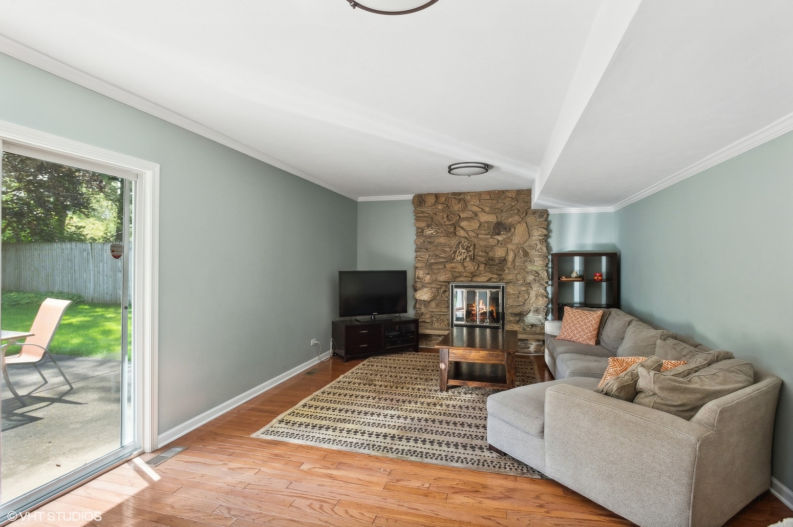 3951 Rutgers Lane Northbrook, IL 60062 - Photo 10 of 22 a living room with furniture and a fireplace