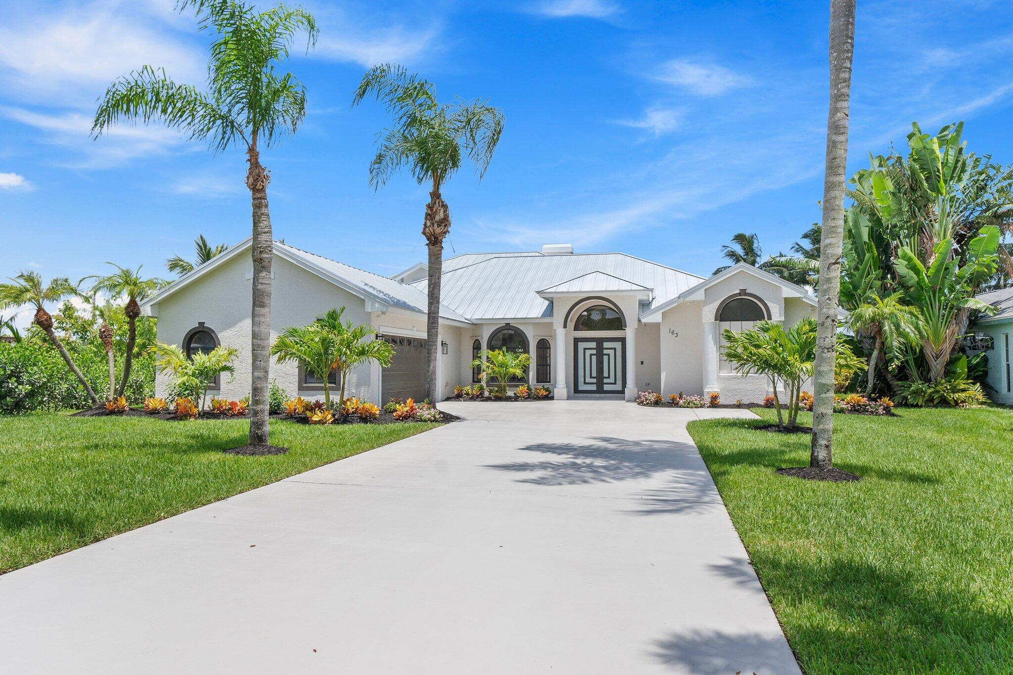 163 Southeast Osprey Ridge Port St. Lucie, FL 34984 - Photo 1 of 111 Front2