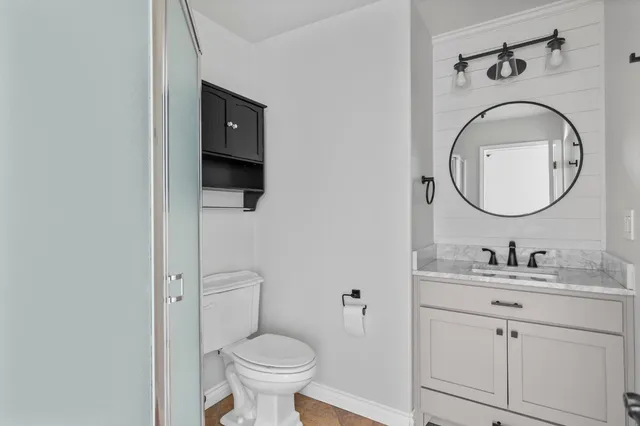 a view of a hallway with washer and dryer
