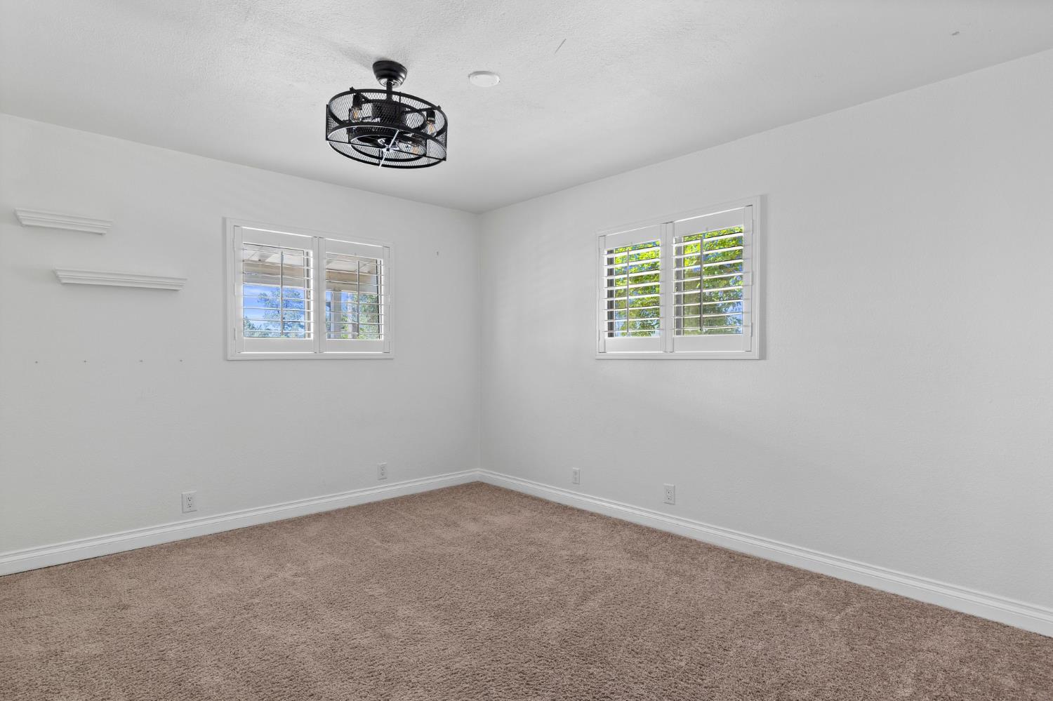 20160 Latrobe Road Plymouth, CA 95669 - Photo 21 of 37 an empty room with a window