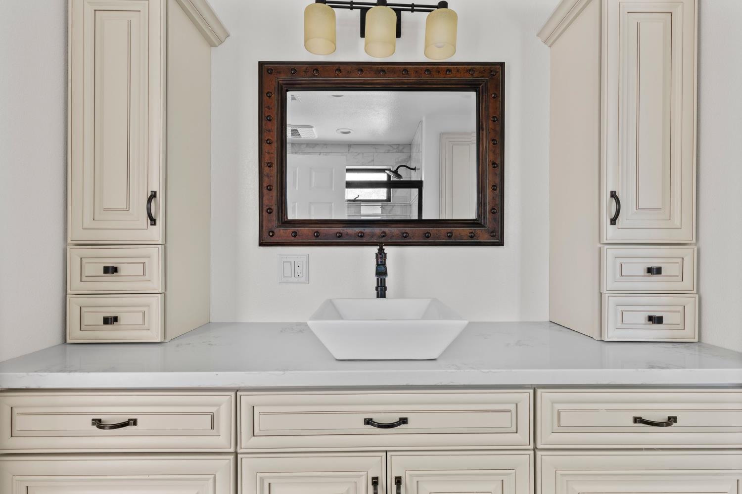 20160 Latrobe Road Plymouth, CA 95669 - Photo 23 of 37 a bathroom with mirror and vanity