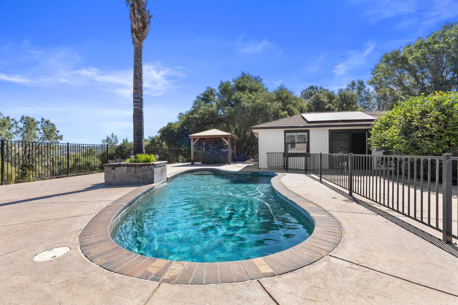20160 Latrobe Road Plymouth, CA 95669 - Photo 30 of 37 a view of a house with swimming pool and porch