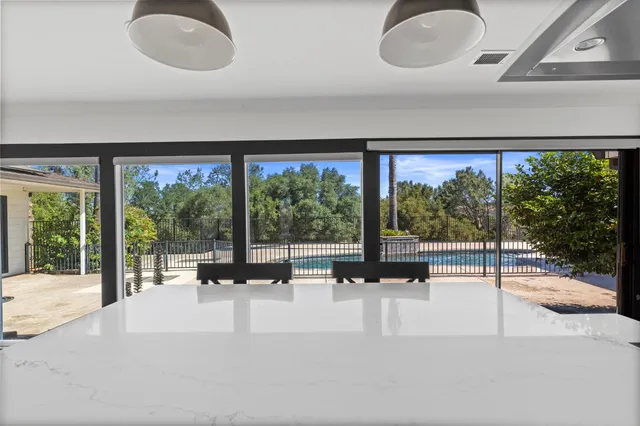 a very nice looking living room with a large window