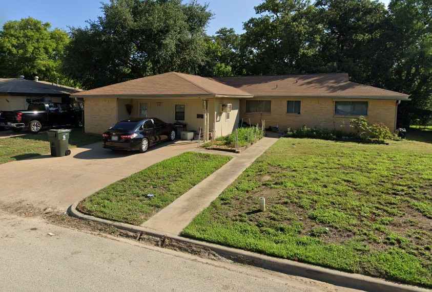 Tbd Truman Street Bryan, TX 77801 - Photo 5 of 13 a view of a house with a yard patio and a fire pit
